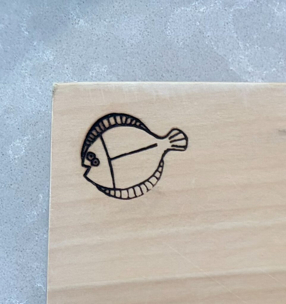 Japanese cutting board: the fish mark on the other face